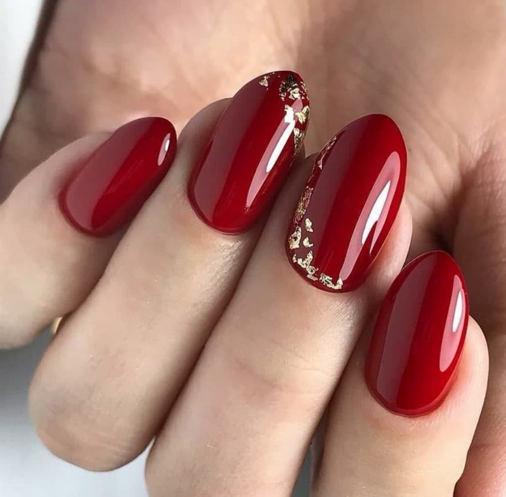 Gel nails in shades of red