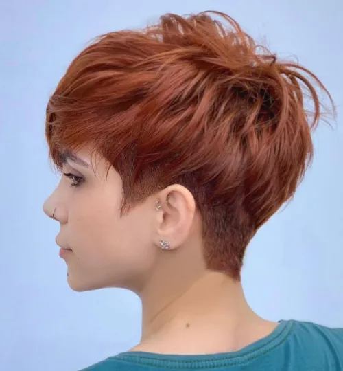 Soft undercut pixie with longer textured top and subtly tapered sides