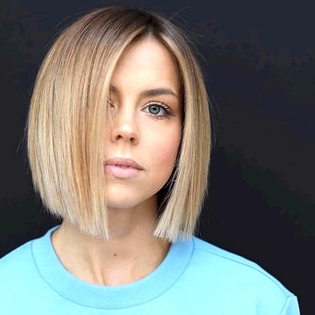 Blunt bob with a full perimeter designed to make fine hair look thicker