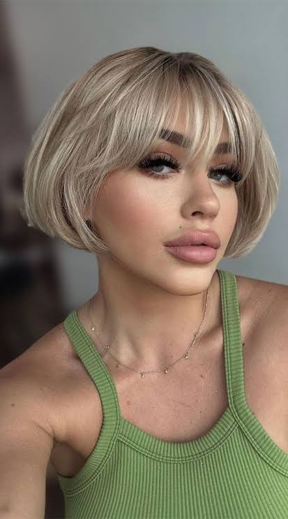 French bob with wispy fringe and soft texture around the jawline